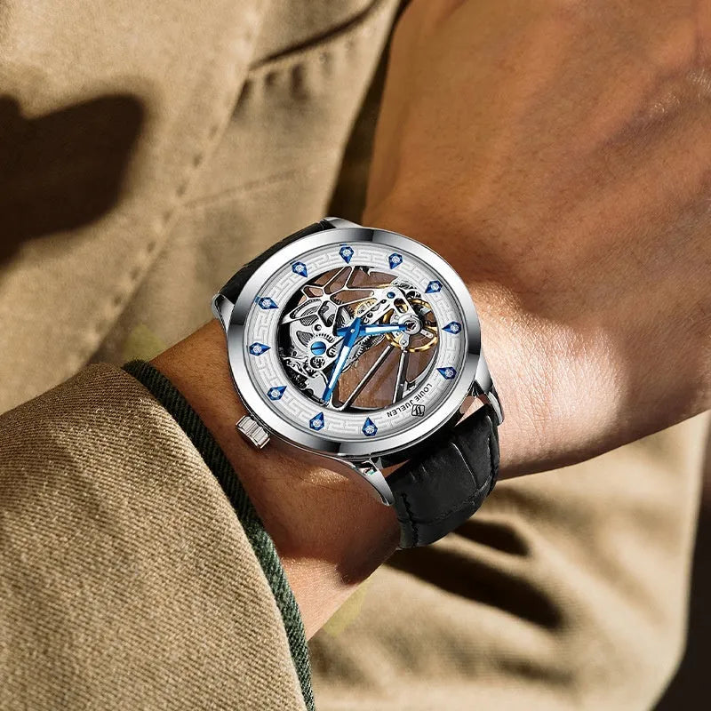 Men's silver mechanical watch with white dial, blue luminous hands and black leather strap