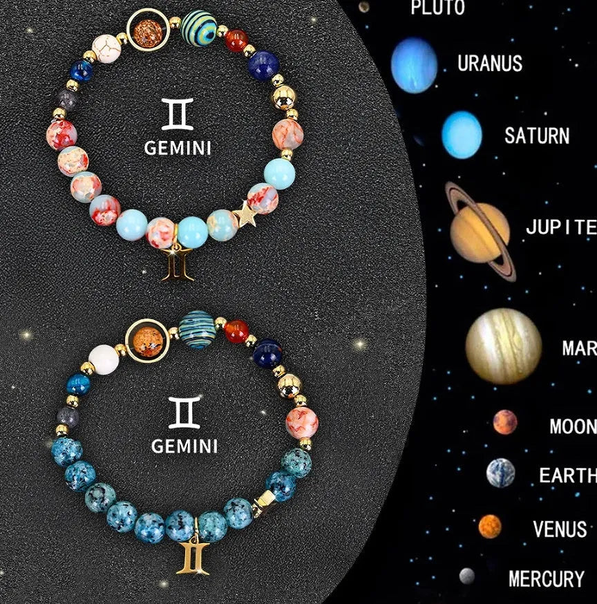 Two natural stone beaded bracelets on a table representing zodiac sign jewellery.