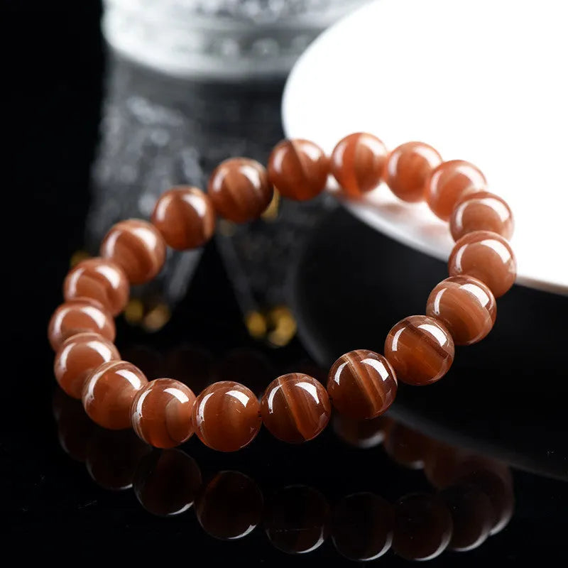 Natural old mine rhodochrosite round beads bracelet with manganese spar construction