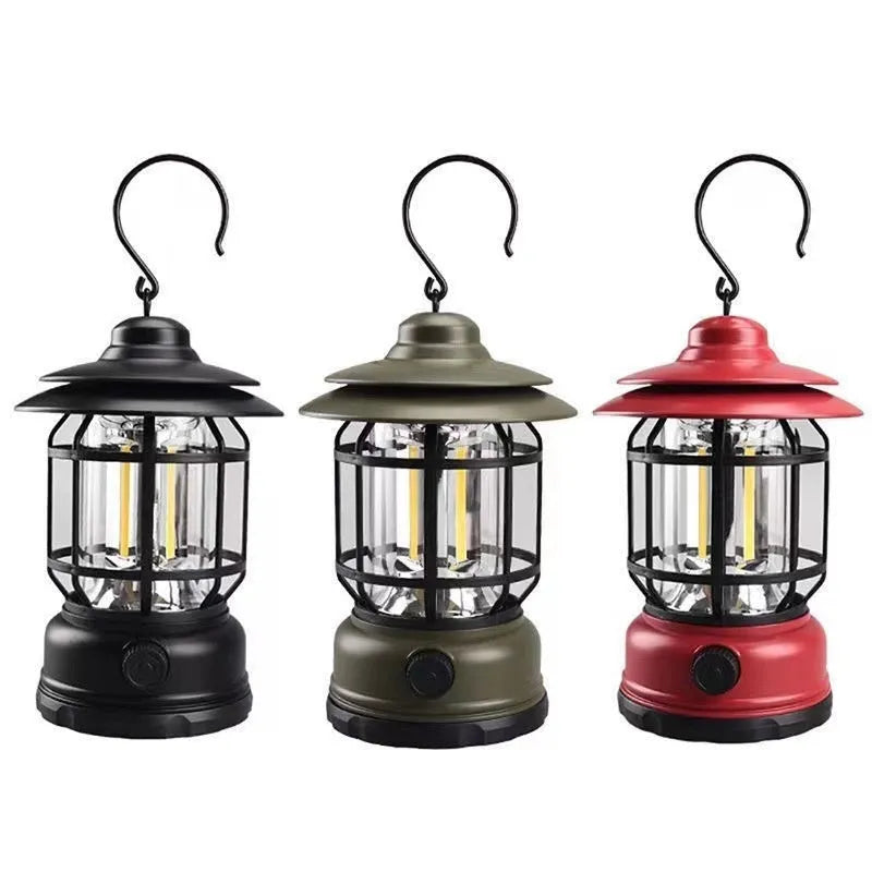 Dark green portable LED camping lantern and head lamp showing compact design and head strap.