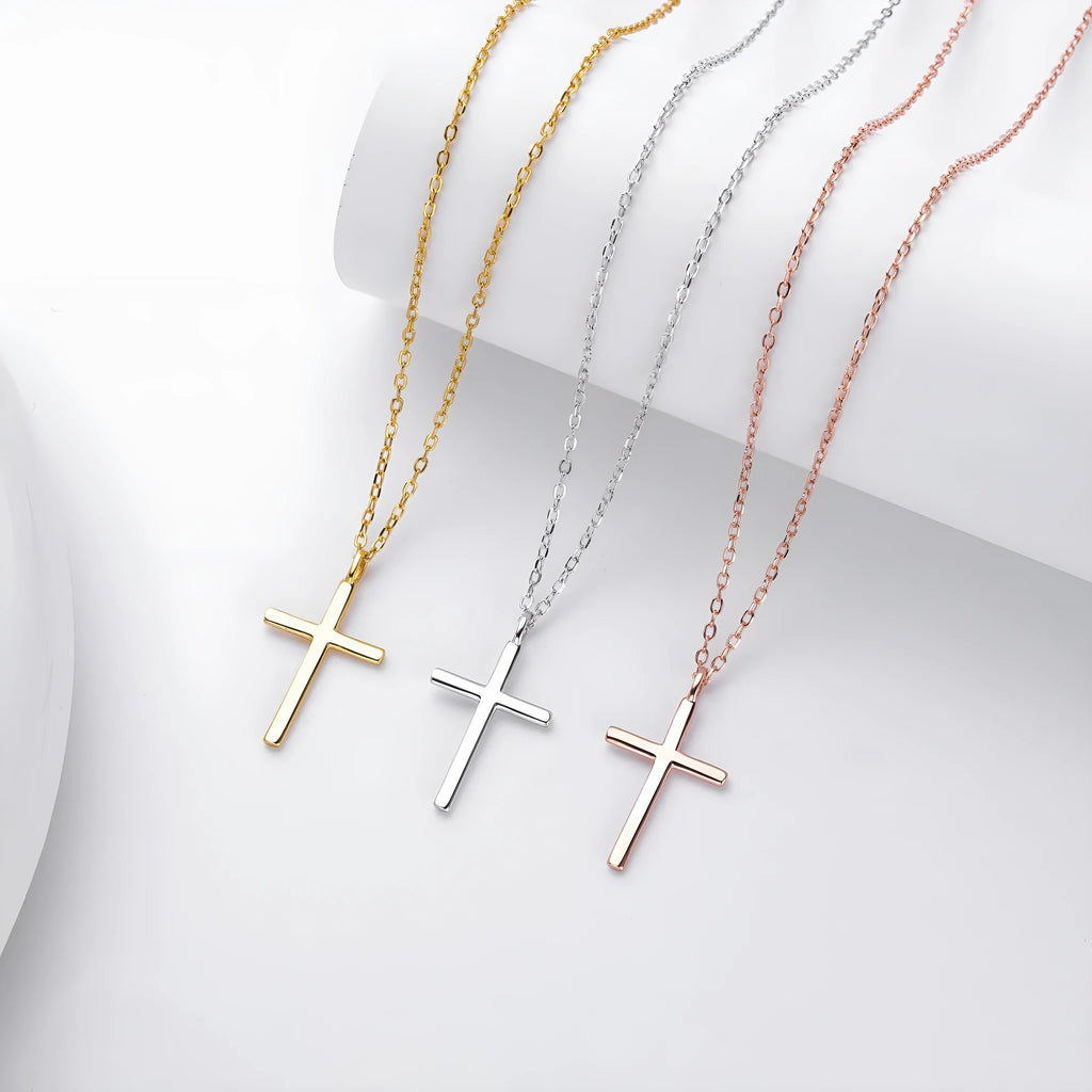 Simple sterling silver cross pendant necklace with glossy finish on adjustable O-link chain