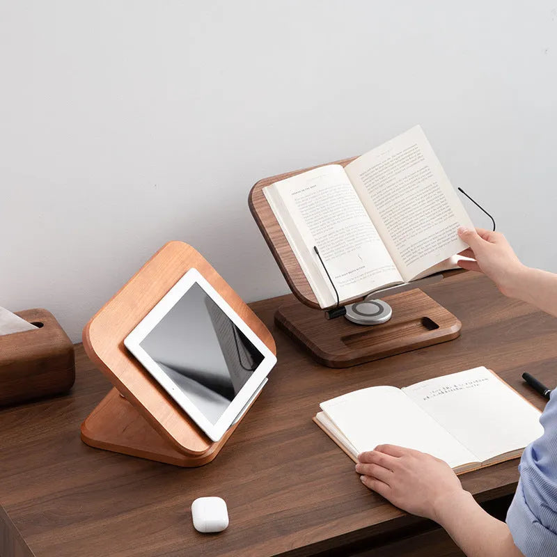 Walnut-coloured solid wood reading rack with an adjustable angle, holding a book.