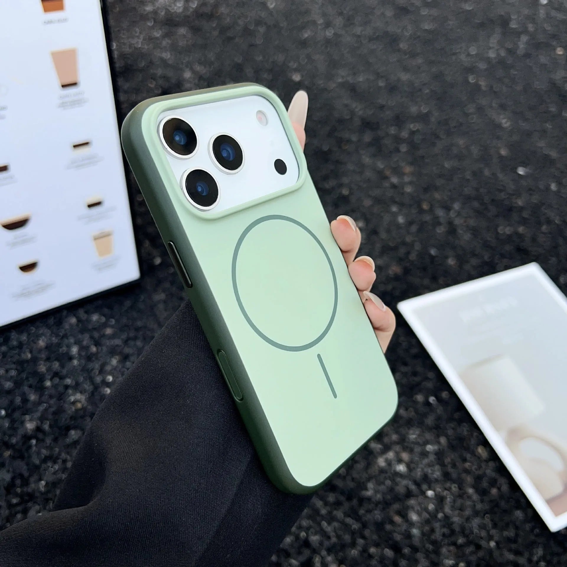 Frosted magnetic phone case for iPhone with a contrasting coloured AI photography button on the side.