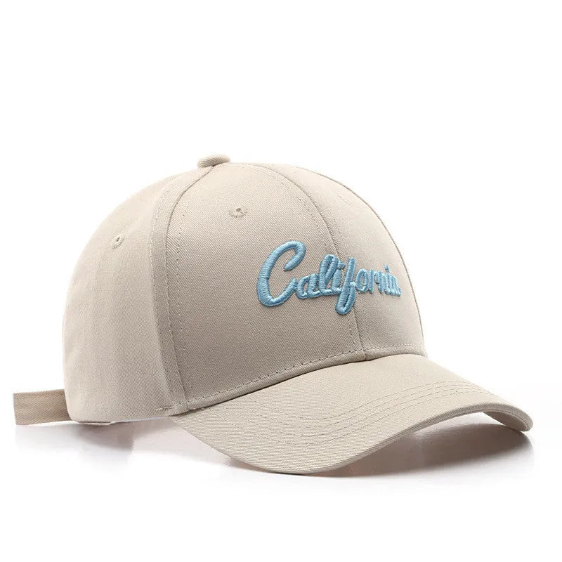 Cotton baseball cap with letter embroidery, curved brim, dome top, adjustable size, in green colour.