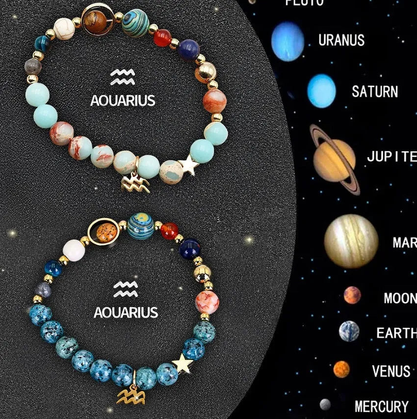 Two natural stone beaded bracelets on a table representing zodiac sign jewellery.