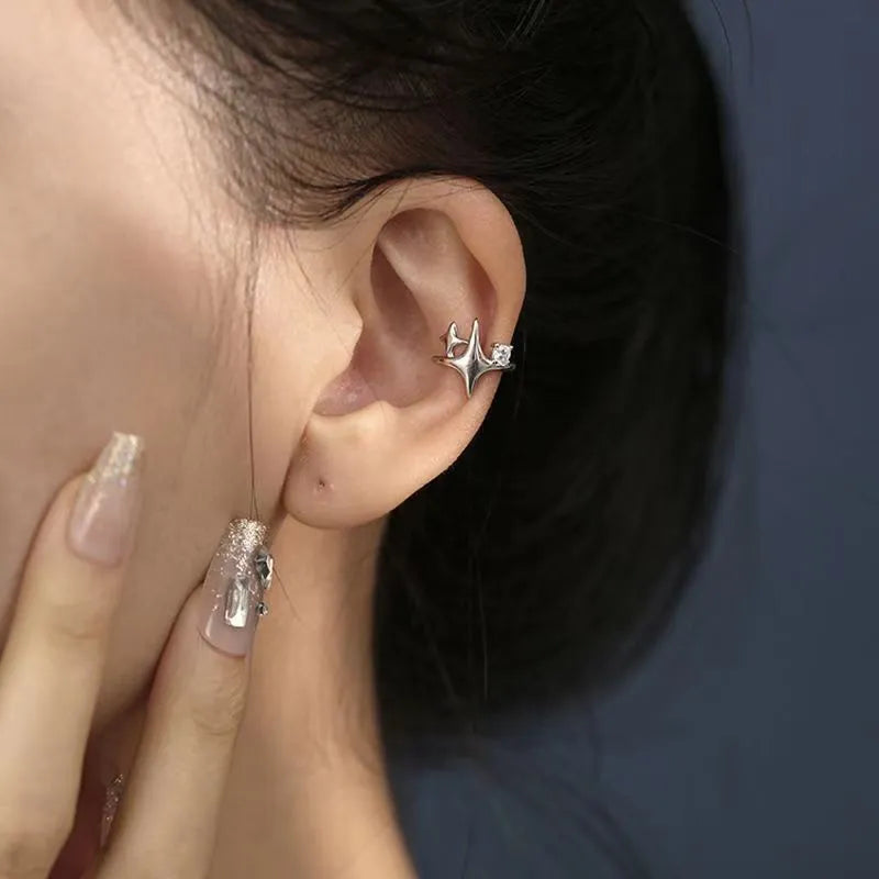 Women's retro geometric small diamond four eight-pointed stars ear clip in silver with electroplated finish