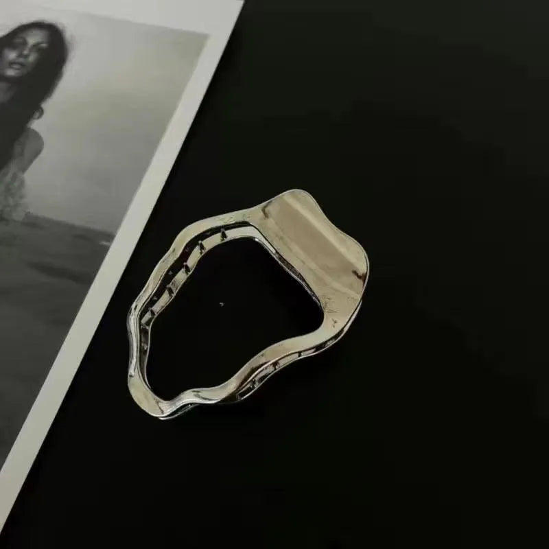 Gold and silver zinc alloy hair clips in arc, square, and triangle geometric shapes