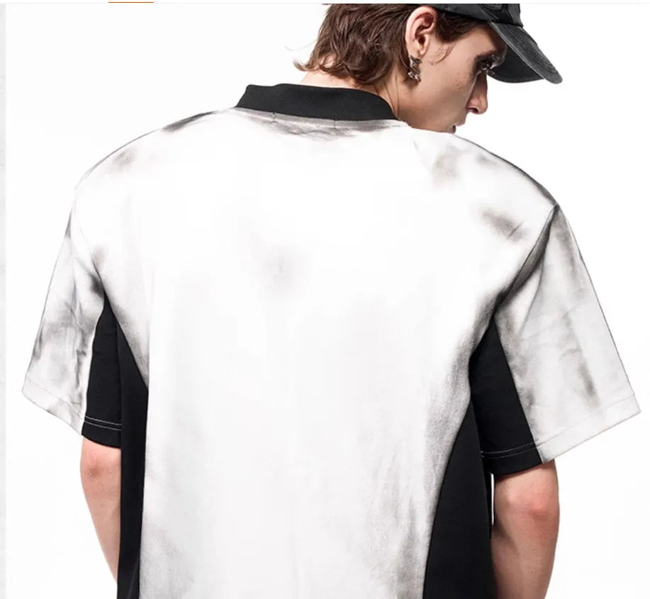 Women's V-neck short sleeve top with a printed letter snake pattern and padded shoulders.