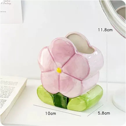 Ceramic flower pen holder storage box with floral patterns in blue, pink and purple colour variations