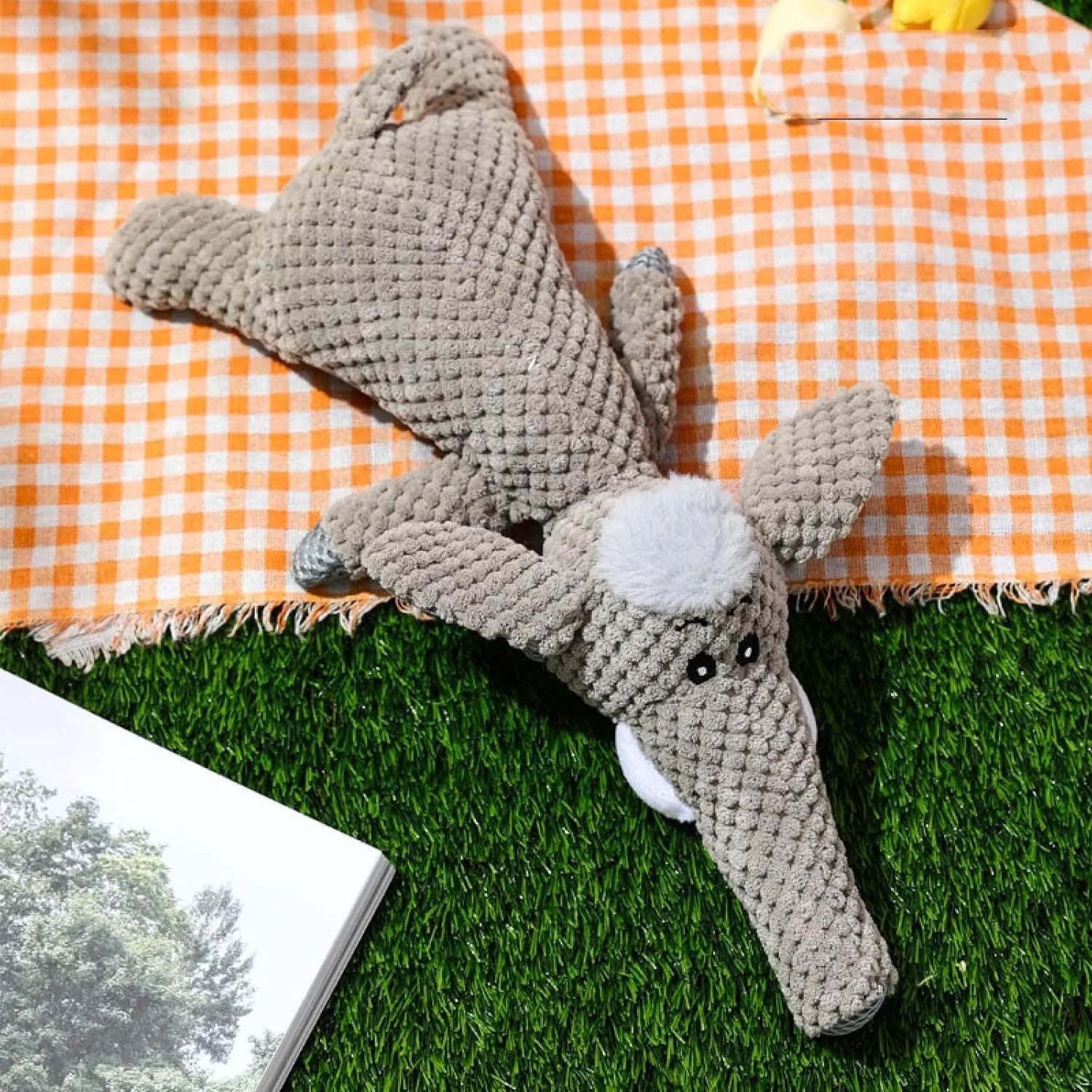 Colourful plush dog chew toy with corn kernel texture and animal shape for teeth grinding and interactive play.