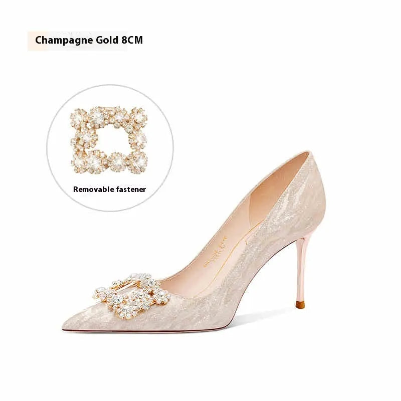 Champagne gold women's high heel pumps with pointed toe and stiletto heel on a plain background.