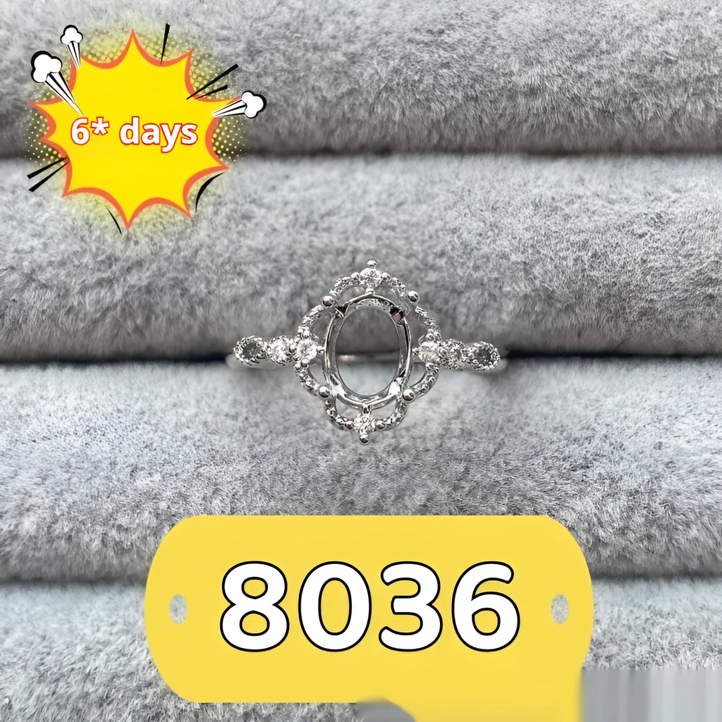 Open-mouth oval denier ring with a 6x8mm stone and five-pointed star decoration on a copper band.