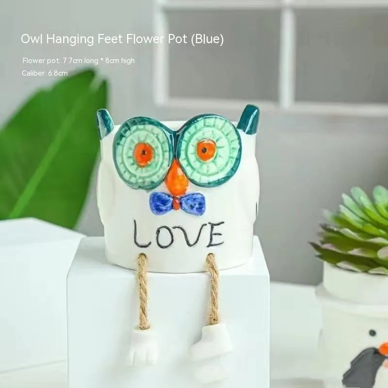 Ceramic hanging foot flowerpot with cartoon design in one of twelve colour variants for succulent plants