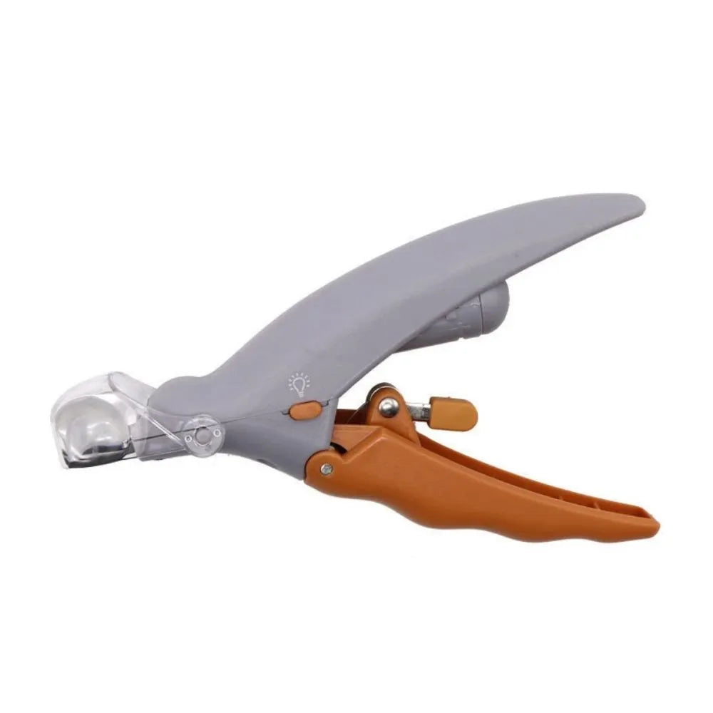 Yellow pet nail clipper with built-in LED light and magnifying lens for dogs and cats.
