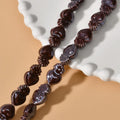 Ceramic heart torch beads in various colours for jewellery making, approximately 10mm by 15mm with straight hole