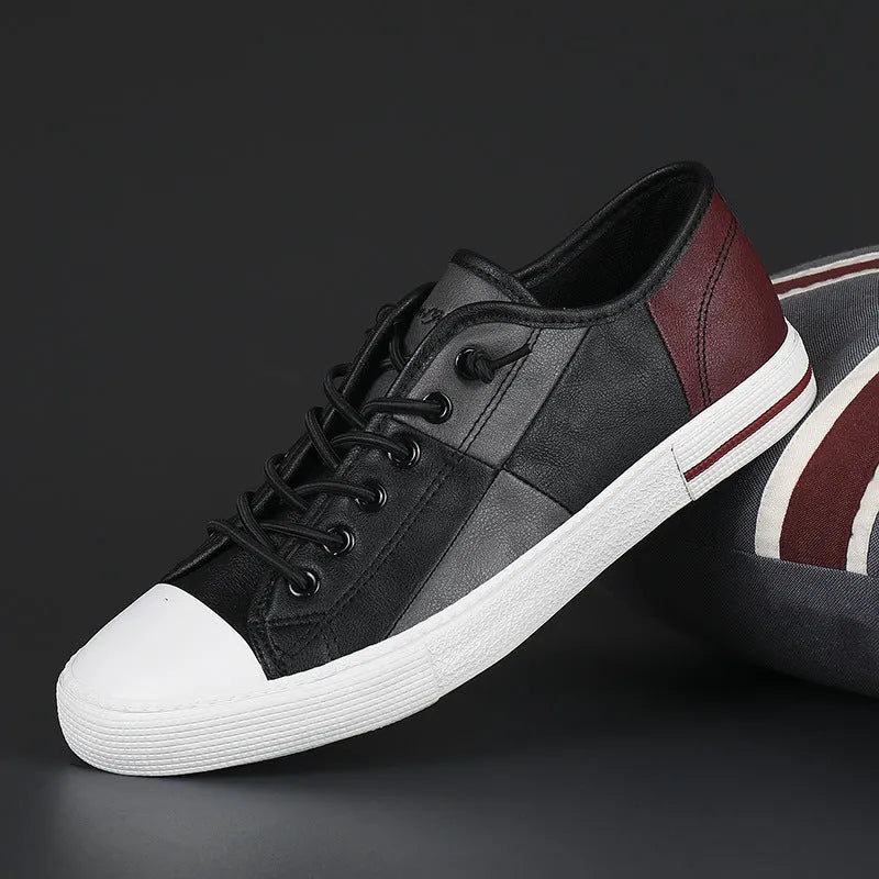 Men's colour contrast leather slip-on shoes with round toe and flat rubber sole.
