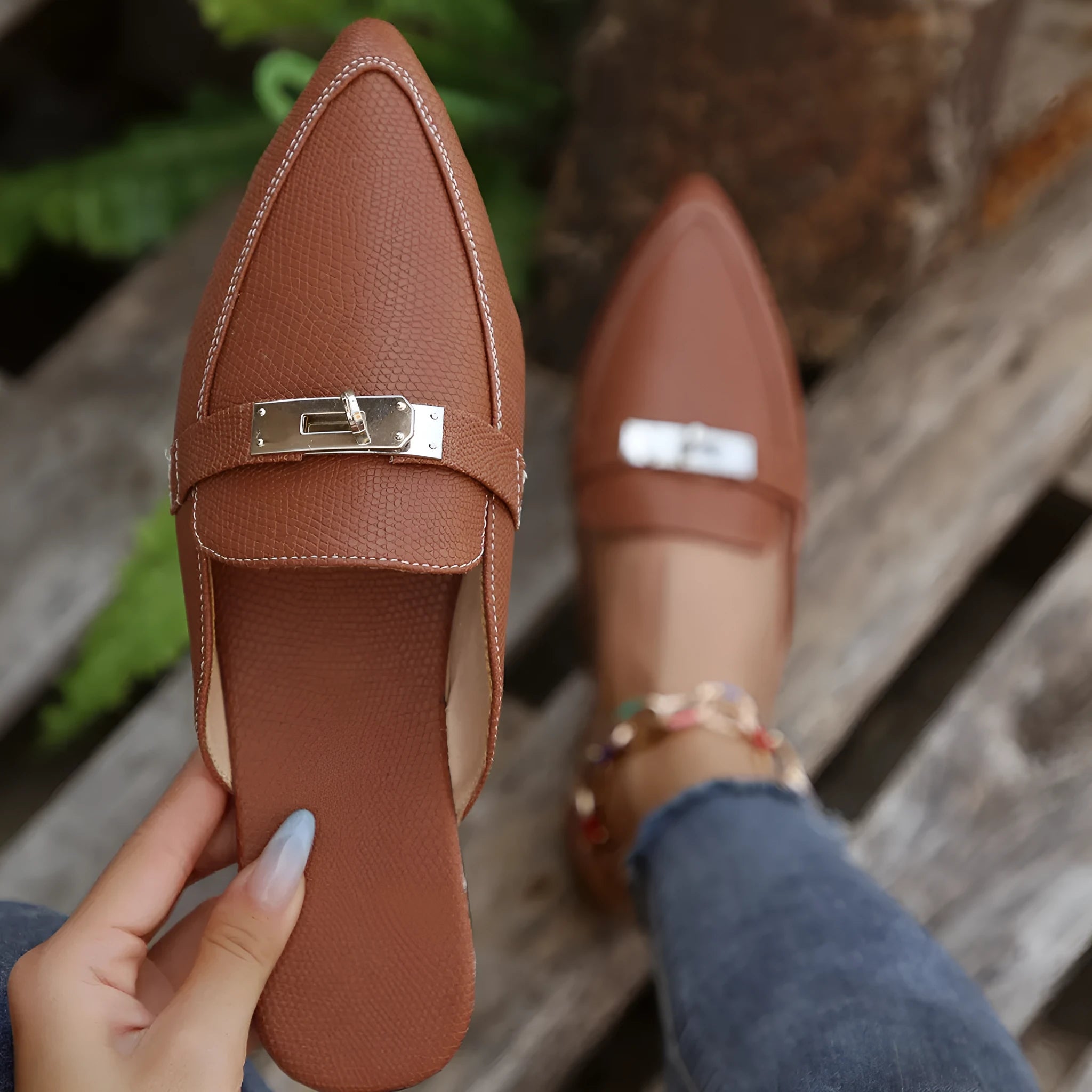 Light brown women's pointed-toe semi-slippers with a low heel and rubber sole
