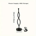Black aluminium desk lamp with a touch dimming button showing three colour LED lights.