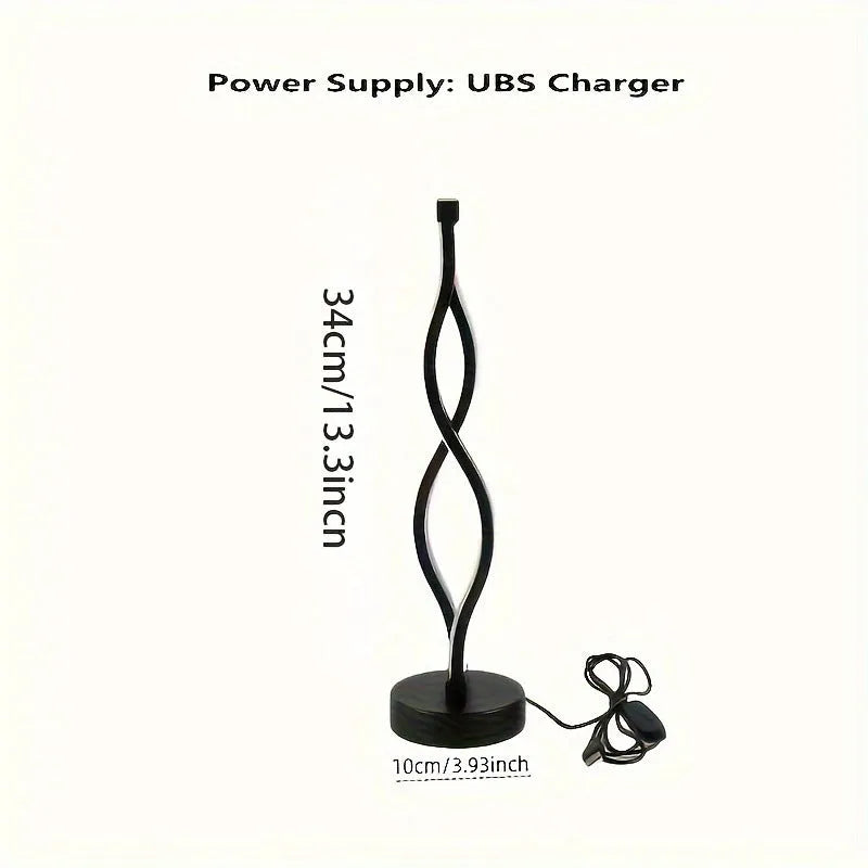 Black aluminium desk lamp with a touch dimming button showing three colour LED lights.