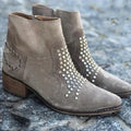 Light grey women's sequined ankle boots with chunky heel, pointed toe, side zipper, and rhinestone accents