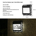 Black solar-powered metal doorplate light with LED house numbers and digital clock display
