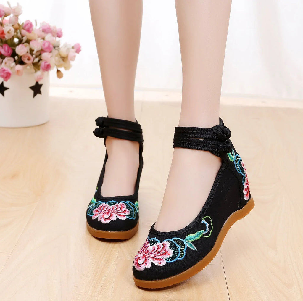 Women's canvas high heels with ethnic pattern, rhinestone detail, and double buckle in beige colour