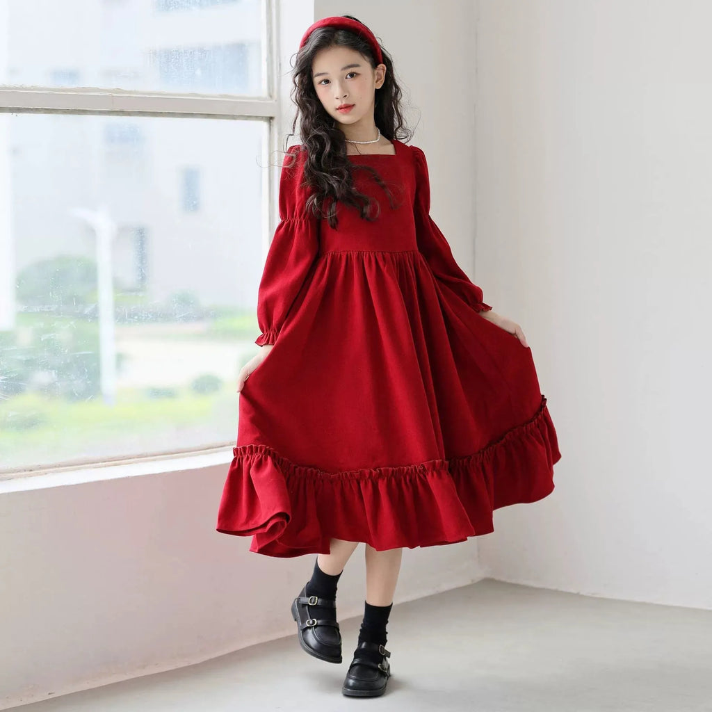 Girl's long sleeve solid red square neck dress with flounce skirt on a child