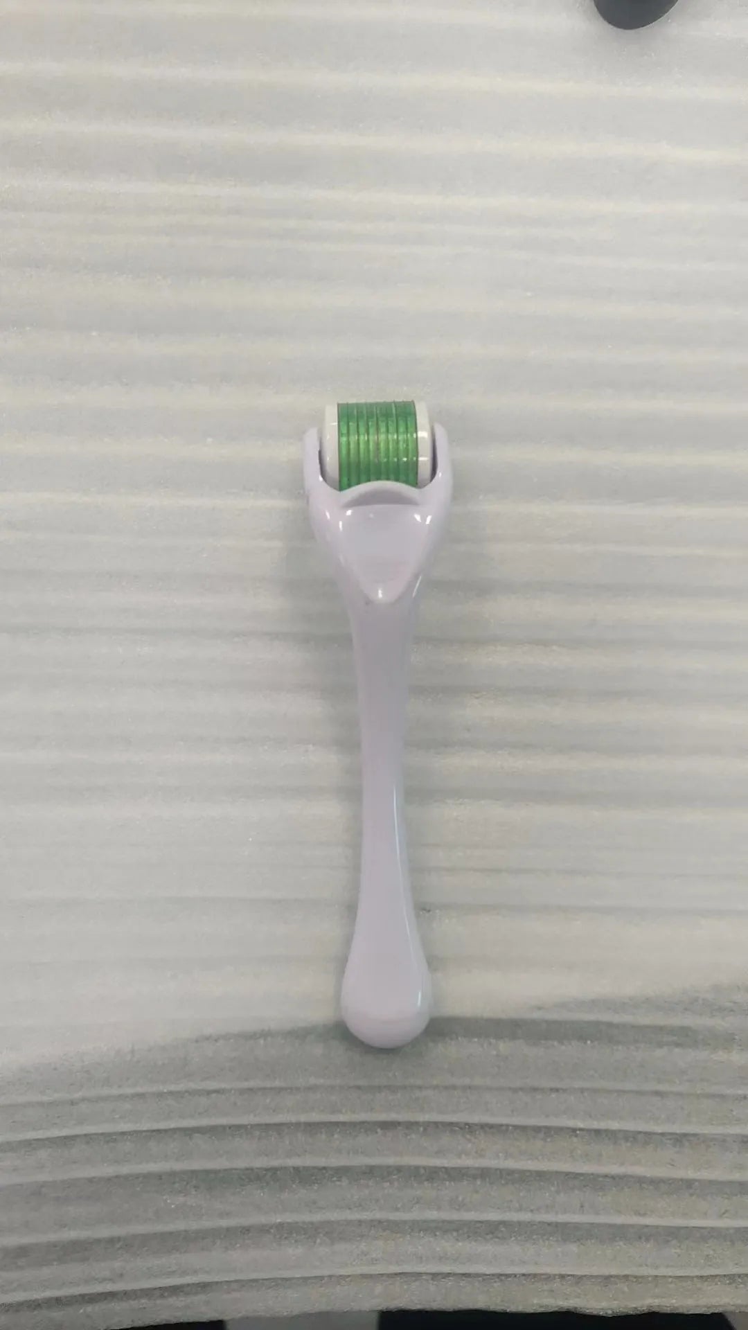 540 micro needle derma roller tool with black handle and purple wheel for 0.2mm 0.25mm 0.3mm cartridges.