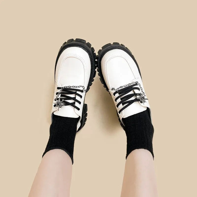 Women's preppy college loafers in Duke Asterism colour with cross-strap and round toe design