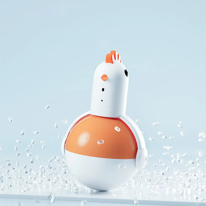 Green or orange electric cat toy chicken with laser and sound features on flat surface