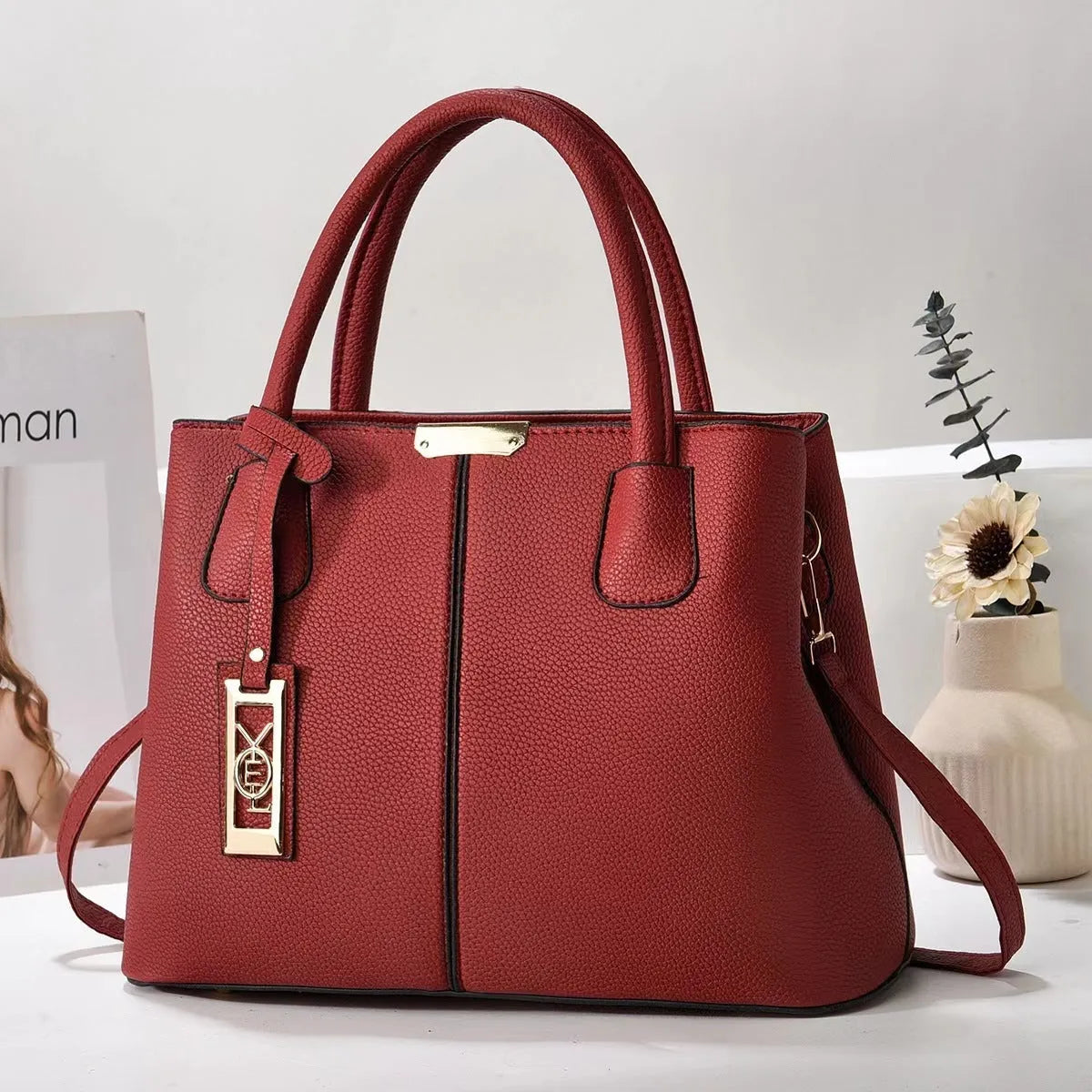 Soft PU fashion handbag with leather shoulder strap in horizontal square shape