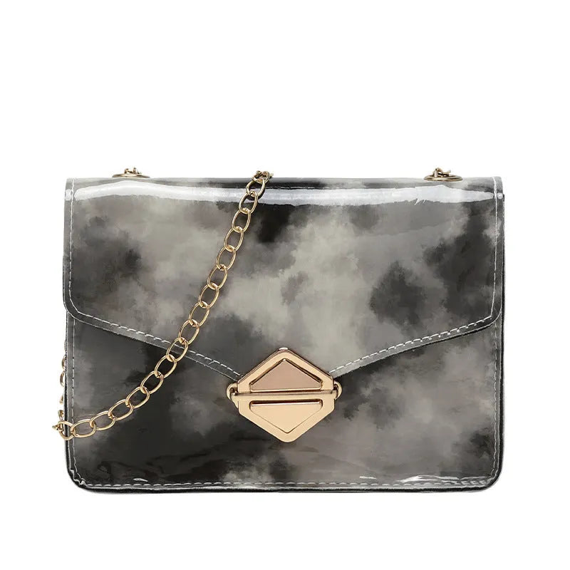 Rainbow Cloud Mist chain bag in light gray, clamshell opening, horizontal square shape, snake chain detail