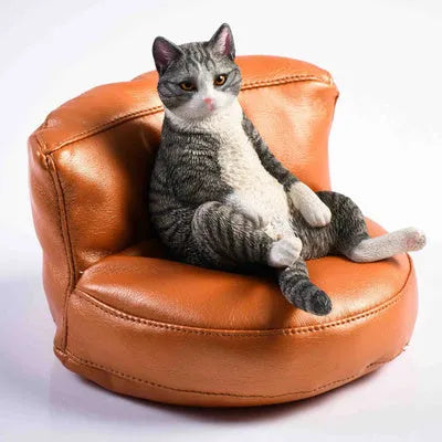 Small 7.5cm lazy cat ornament with sofa on car dashboard