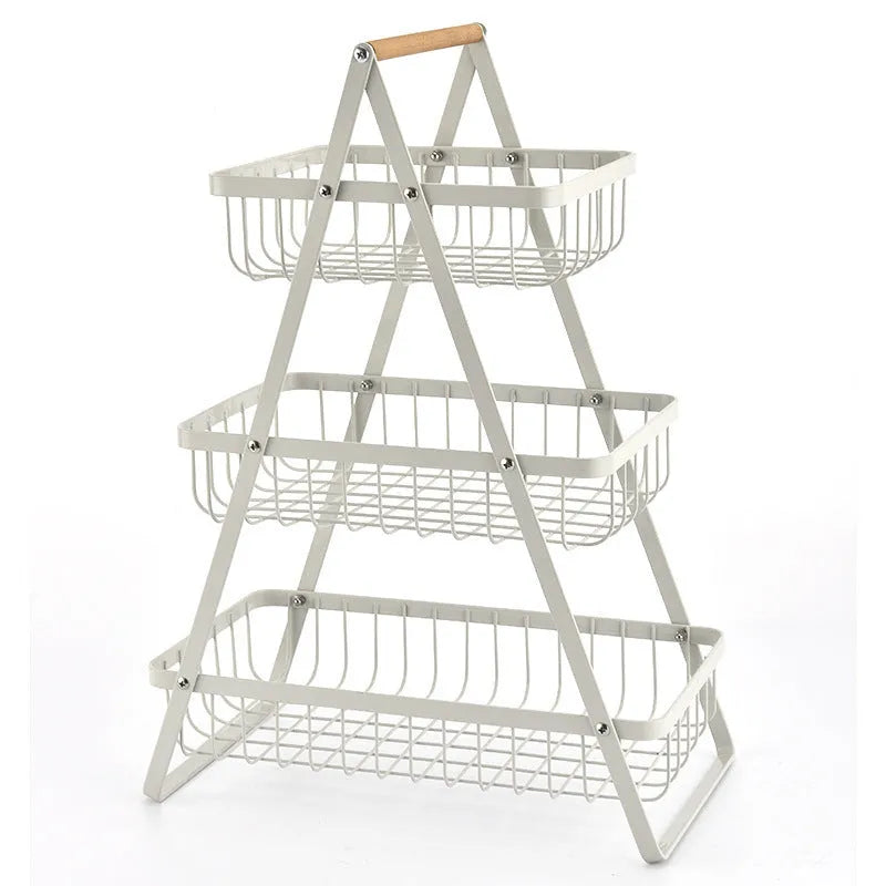 Detachable double-layer iron fruit basket with wooden handle in black on a kitchen tabletop