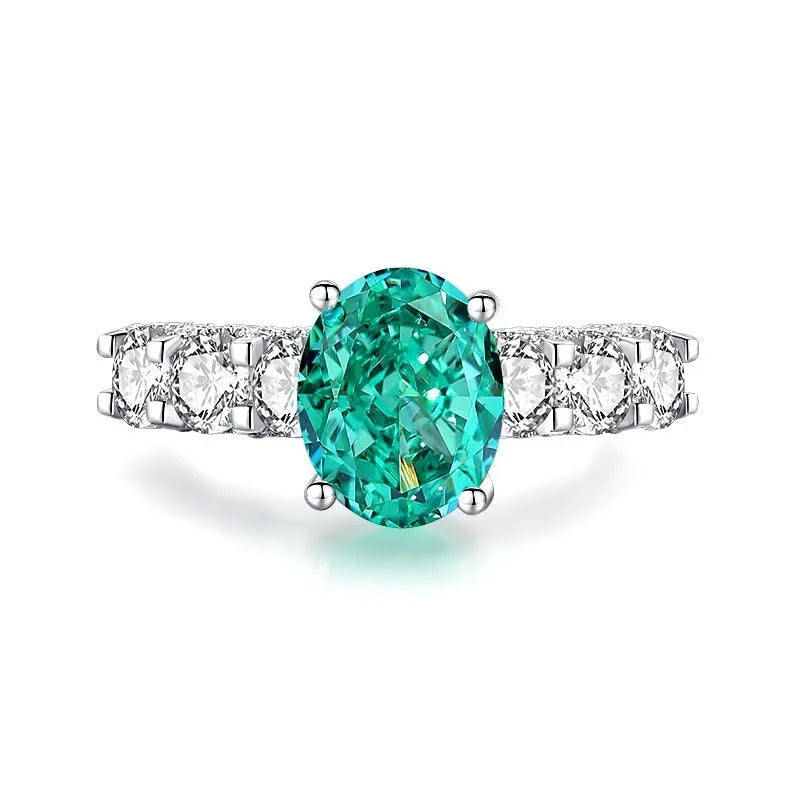 S925 sterling silver ring for women with a green emerald stone set using Palaibahao inlay and diamond accents.