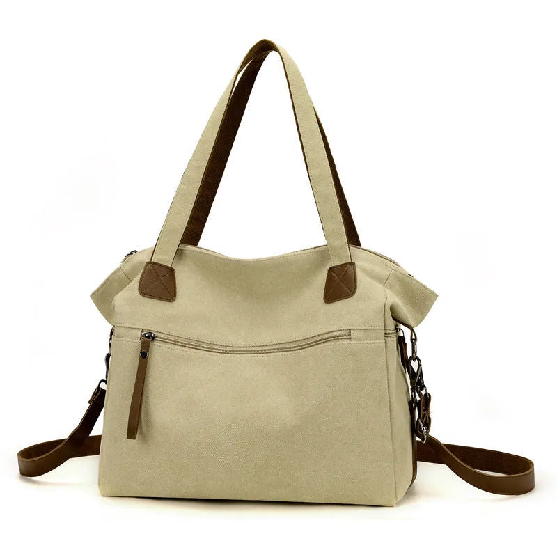 Large capacity soft canvas shoulder bag in khaki with horizontal square shape and outer sandwich pocket