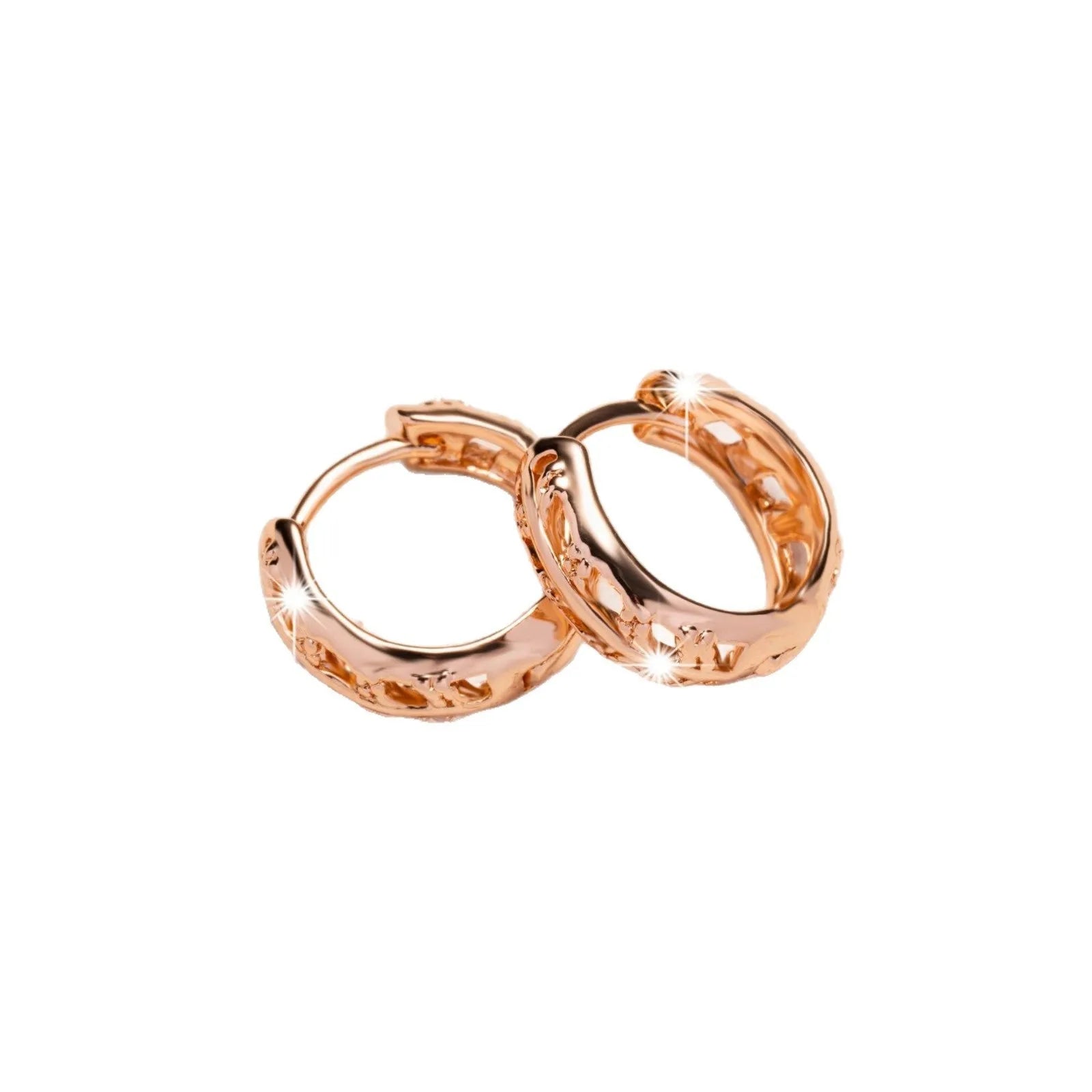 Hollowed copper earrings in heart or leaf shape with rose gold finish