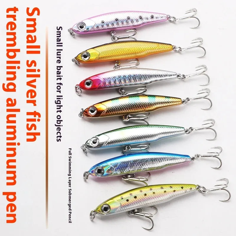 Set of five small silver fish lure pencil baits with double hooks and a tackle box