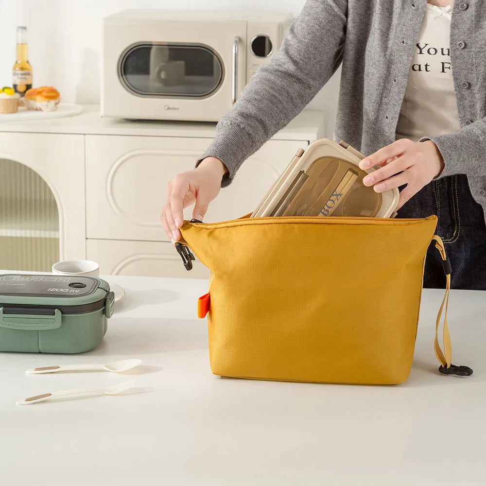 Japanese style thermal insulated lunch bag in Oxford cloth, grey colour, showing wide opening.