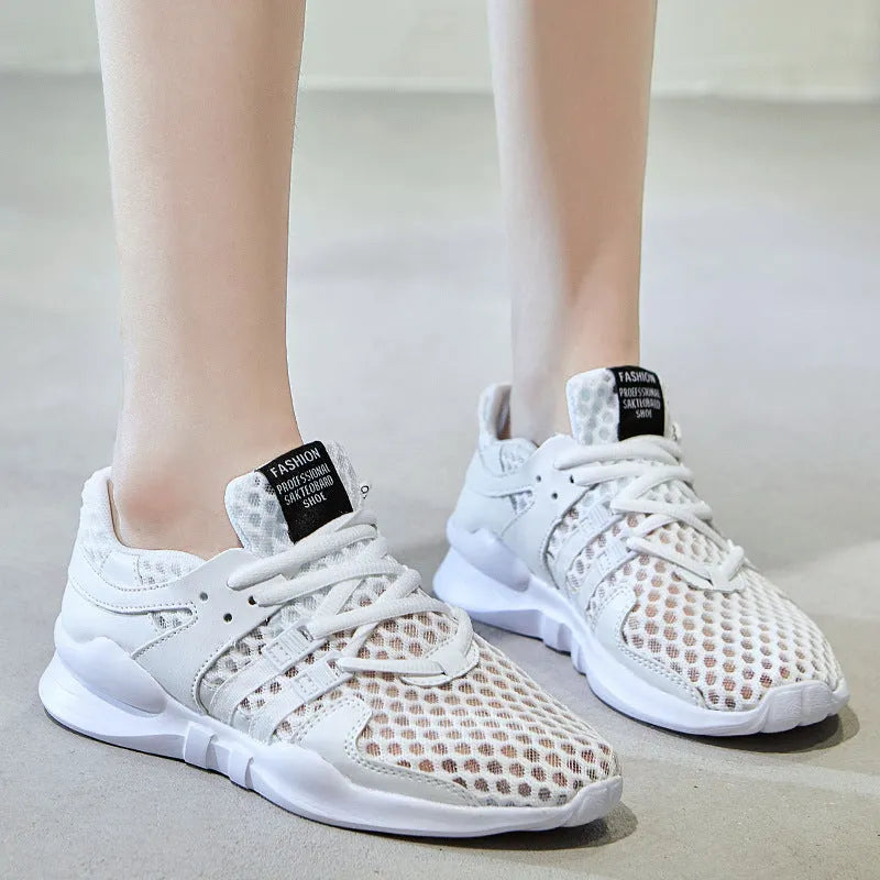 Men's low-top casual sneakers with hollow white mesh upper and round toe on a flat EVA sole.