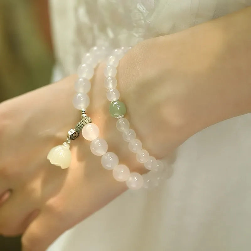 Women's bracelet with S925 silver and white agate Hetian jade in geometric lotus design