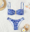 Women's orange high-waisted floral bikini swimsuit with matching bra