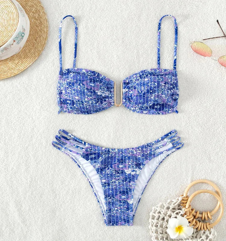 Women's orange high-waisted floral bikini swimsuit with matching bra
