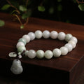 Green jade bracelet with geometric hanging beads and Maitreya Buddha charm
