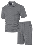Men's patterned cloth short sleeve polo suit in light blue, shown with matching trousers.