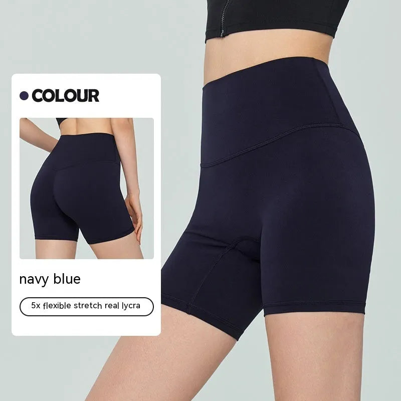 Women's lycra yoga tight shorts in leaf green colour showing high waist and short length design