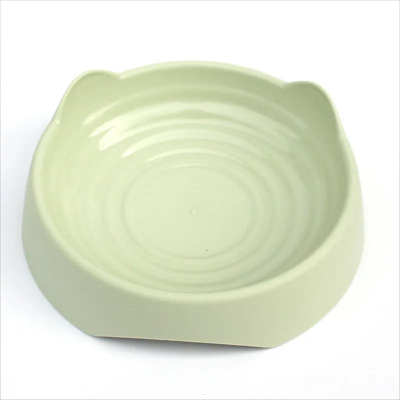 Ceramic dog slow feeder bowl in blue, green, or pink with puzzle maze design for large or small dogs