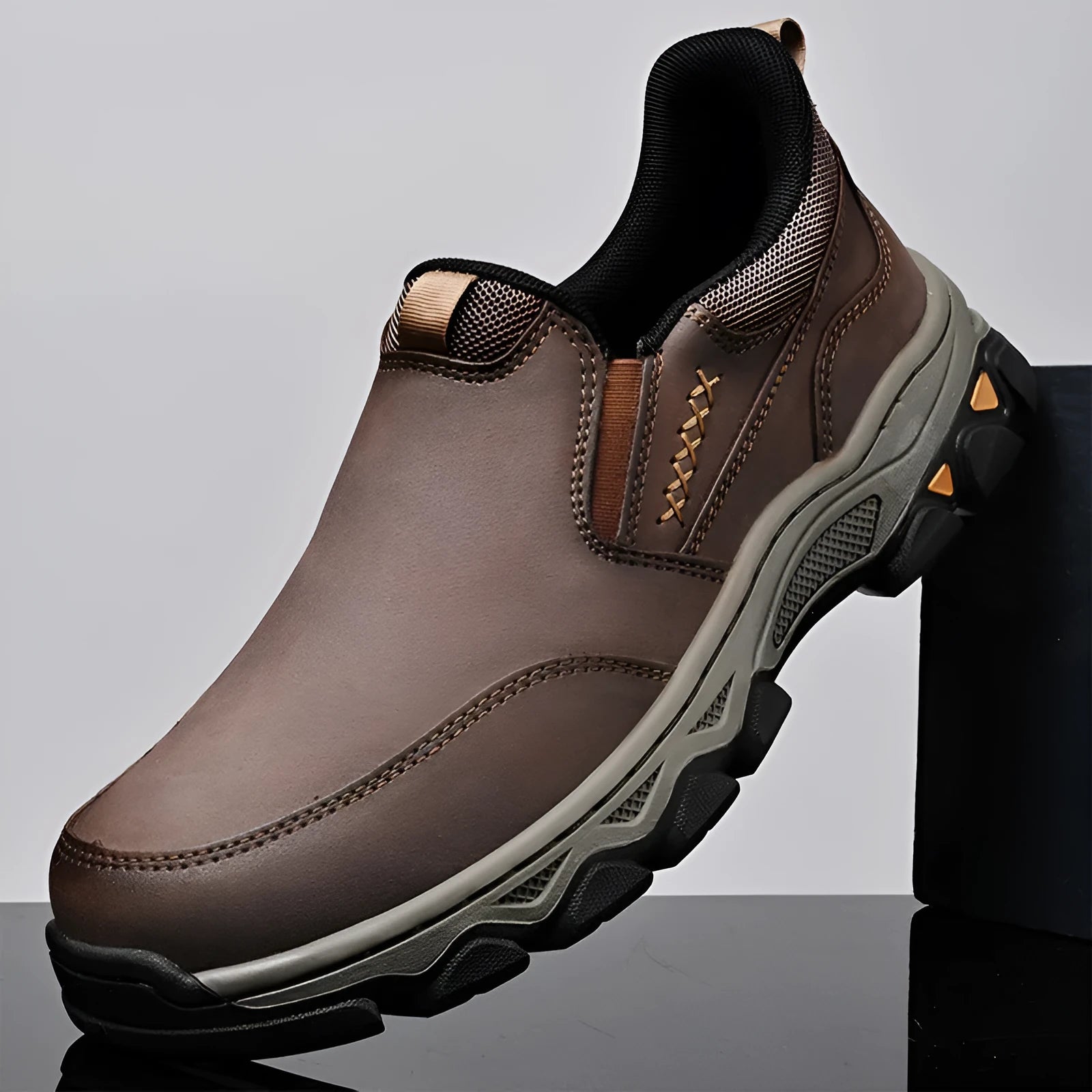 Men's dark brown casual shoes with PU leather upper and rubber sole shown in round toe flat heel design