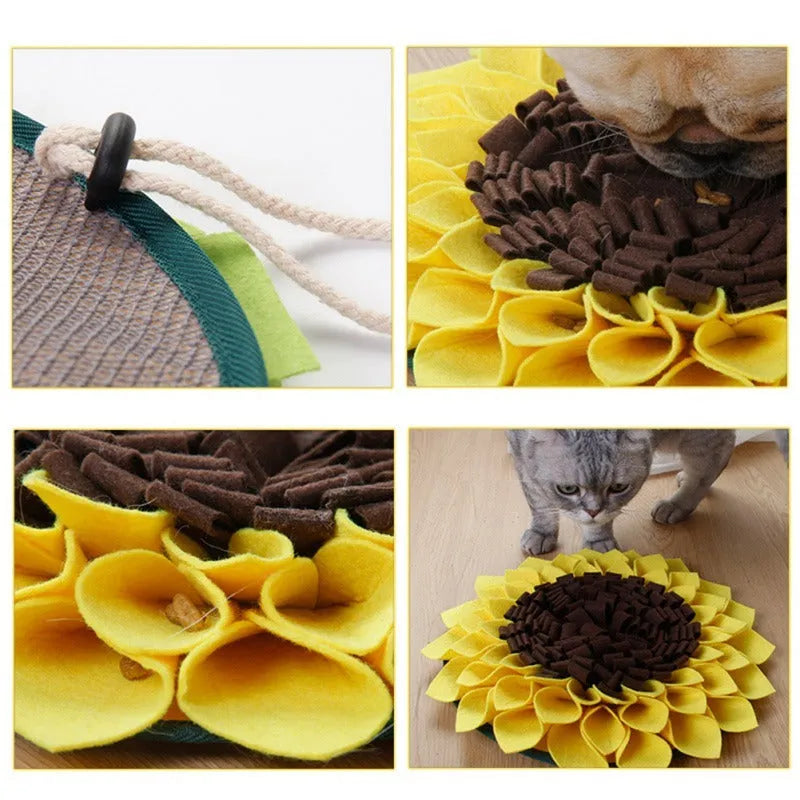 Yellow sunflower-shaped dog snuffle mat with fleece texture and a hanging rope buckle.