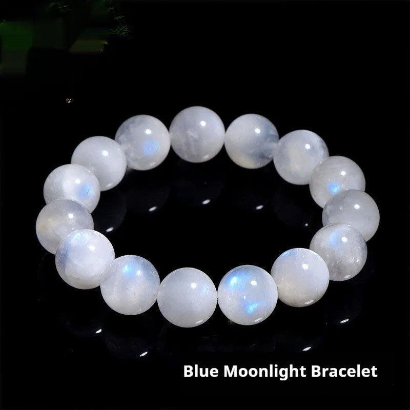 Natural blue moonlight round bead moonstone bracelet on wrist showing polished gemstone beads